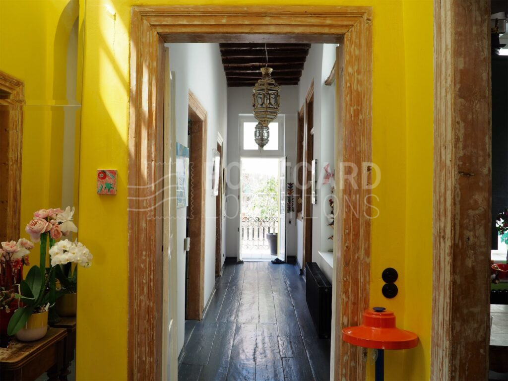 Cheerful Colorful House in Neoclassical Building