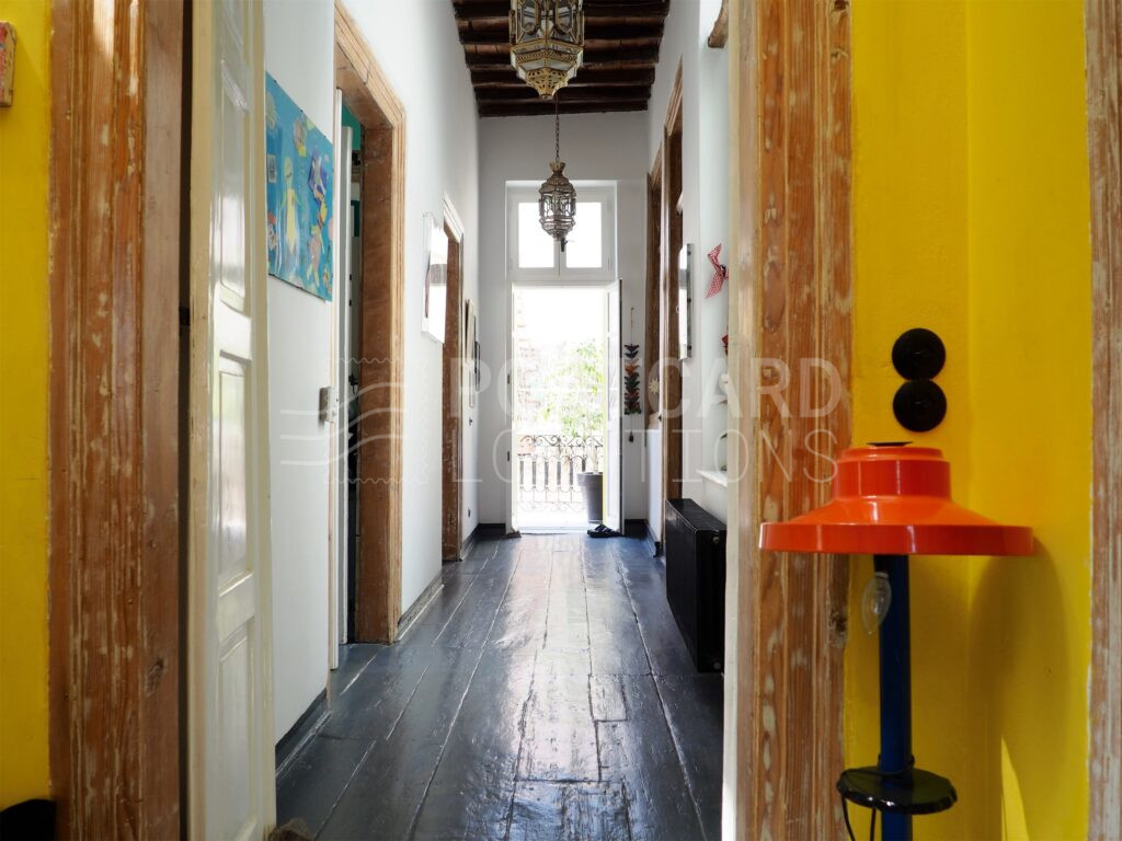 Cheerful Colorful House in Neoclassical Building