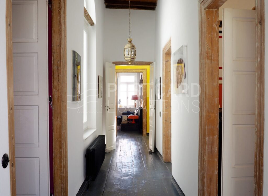 Cheerful Colorful House in Neoclassical Building