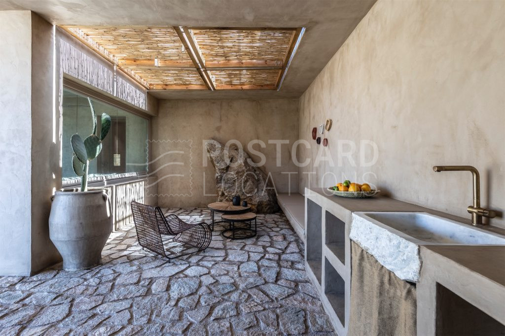 Luxury earthy pool villas overlooking the sea