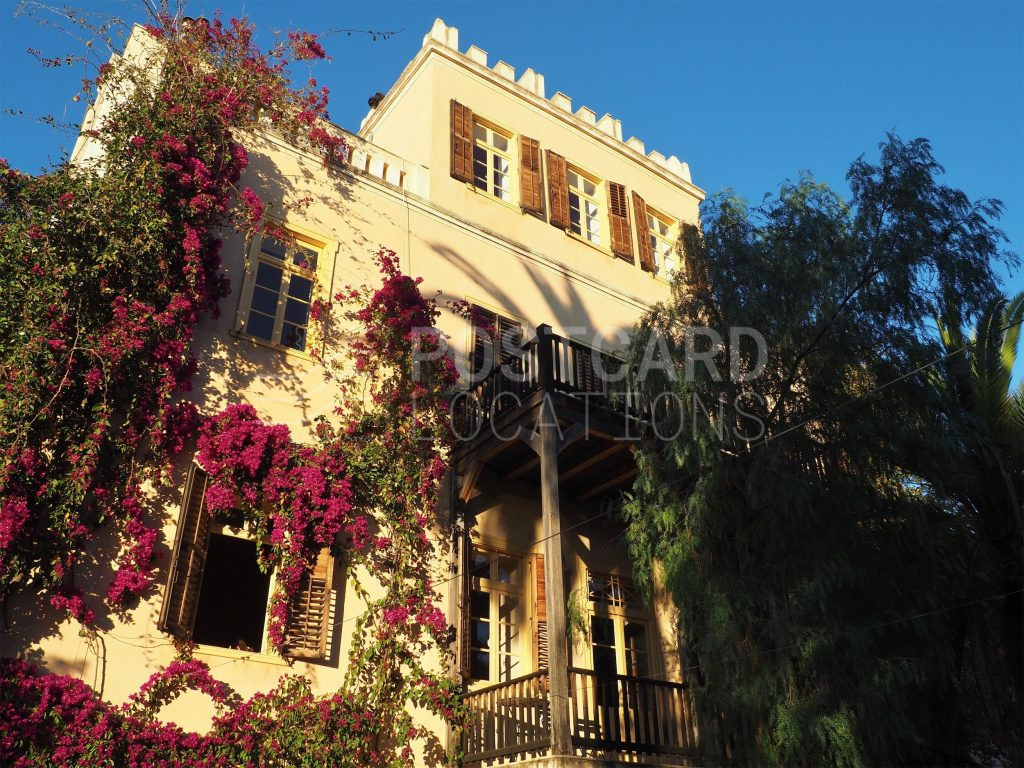 19th century mansion surrounded by huge garden