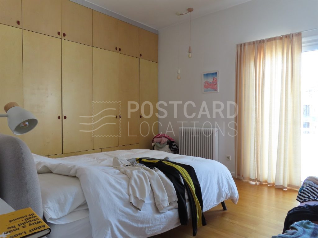 Bright and colorful open-plan space in 1980s apartment block