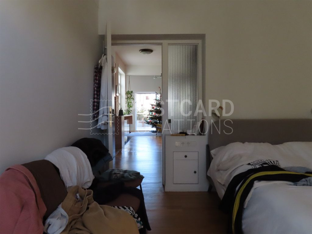 Bright and colorful open-plan space in 1980s apartment block