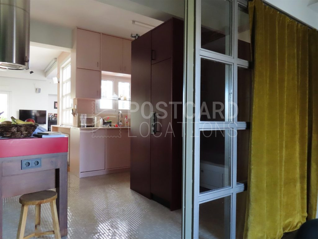 Bright and colorful open-plan space in 1980s apartment block