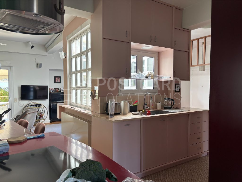 Bright and colorful open-plan space in 1980s apartment block