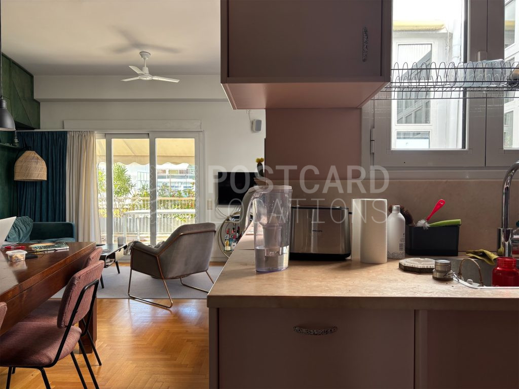 Bright and colorful open-plan space in 1980s apartment block