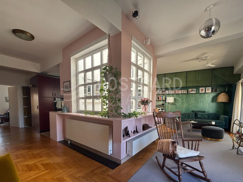Bright and colorful open-plan space in 1980s apartment block