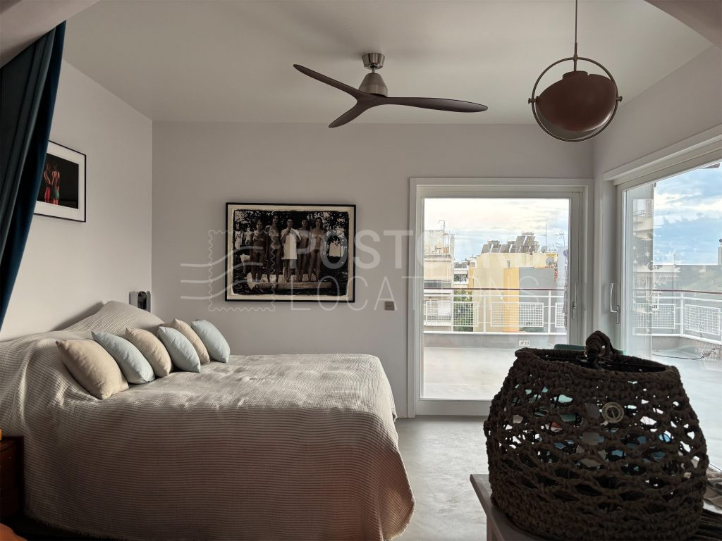 Island-inspired penthouse with large balcony and city views