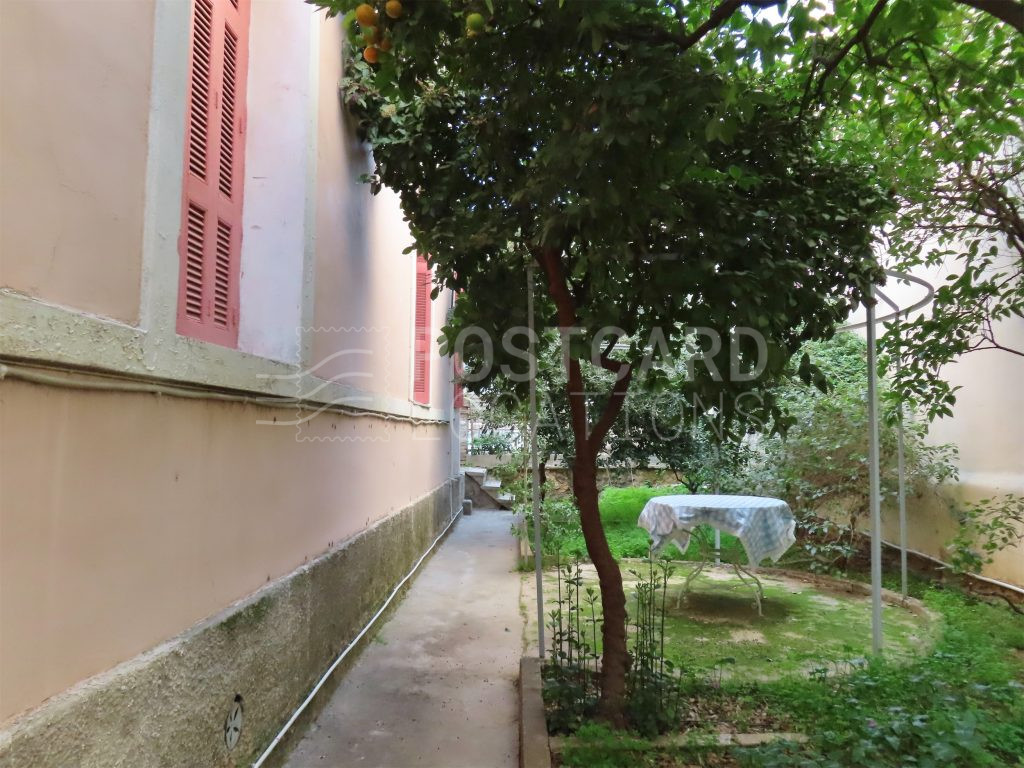 1930s neoclassical house with garden